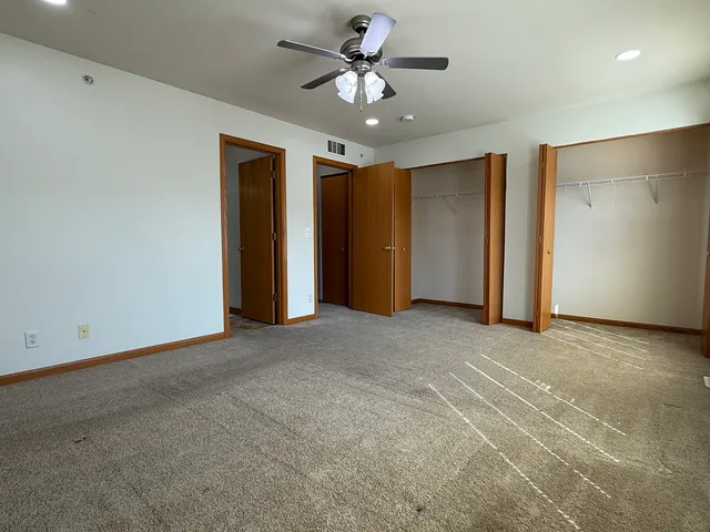a view of a livingroom with a ceiling fan