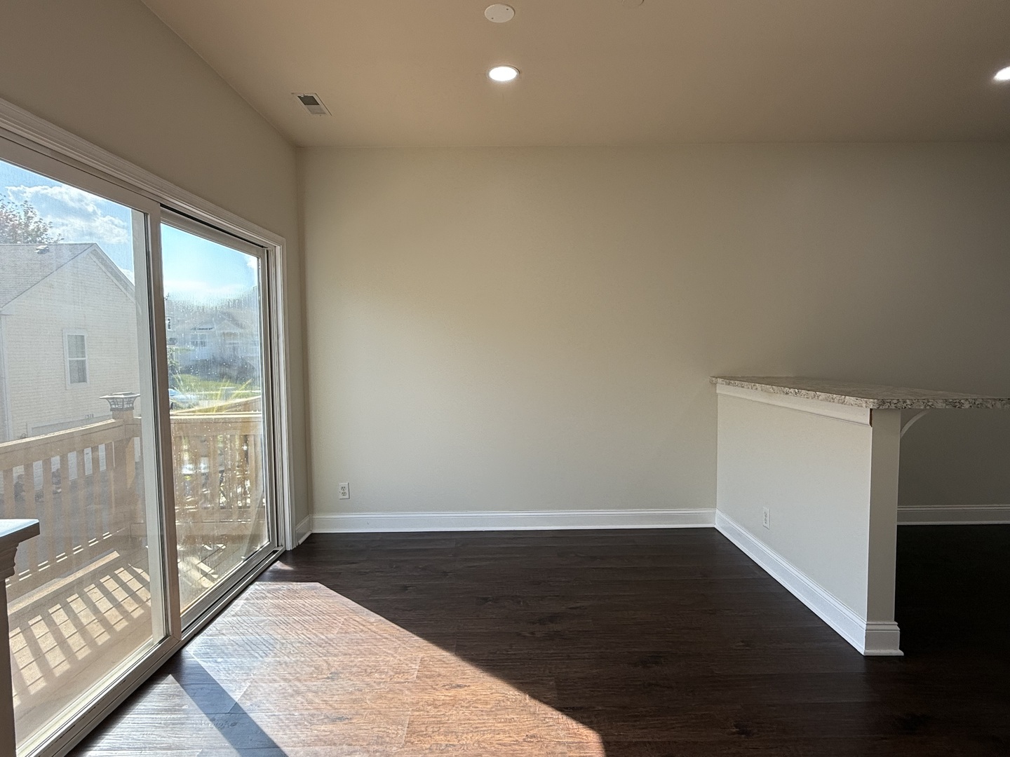 1392 Carolyn Court Yorkville, IL 60560 - Photo 7 of 23 an empty room with wooden floor and windows