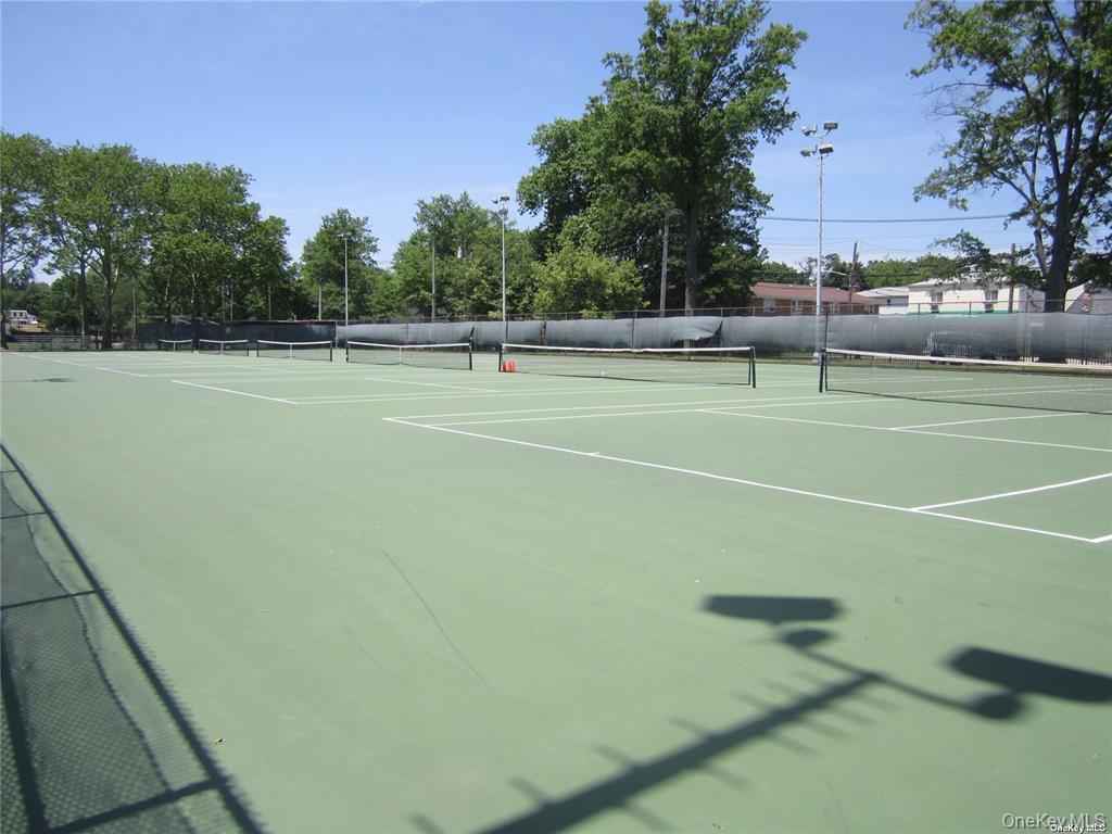 44 Graywood Road, Unit 2 Port Washington, NY 11050 - Photo 14 of 17 a view of a tennis court