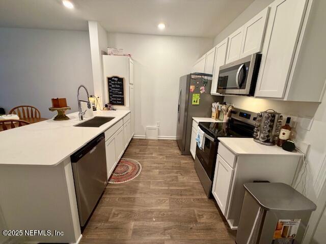 871 Rivertree Place Middleburg, FL 32068 - Photo 4 of 9 a kitchen with stainless steel appliances a sink stove and refrigerator