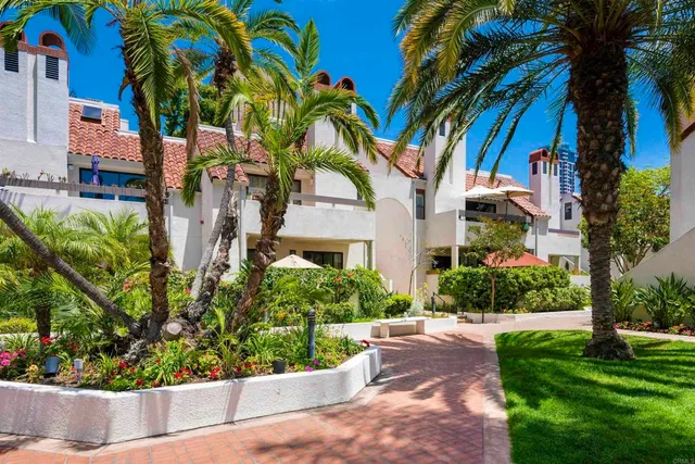 a white refrigerator freezer sitting in a kitchen