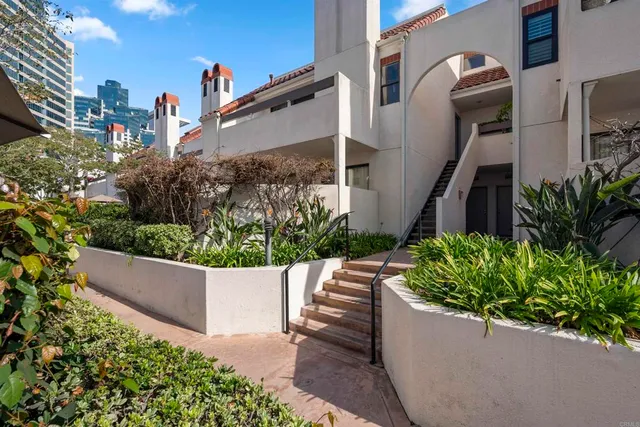 a view of a dining room with furniture and rug
