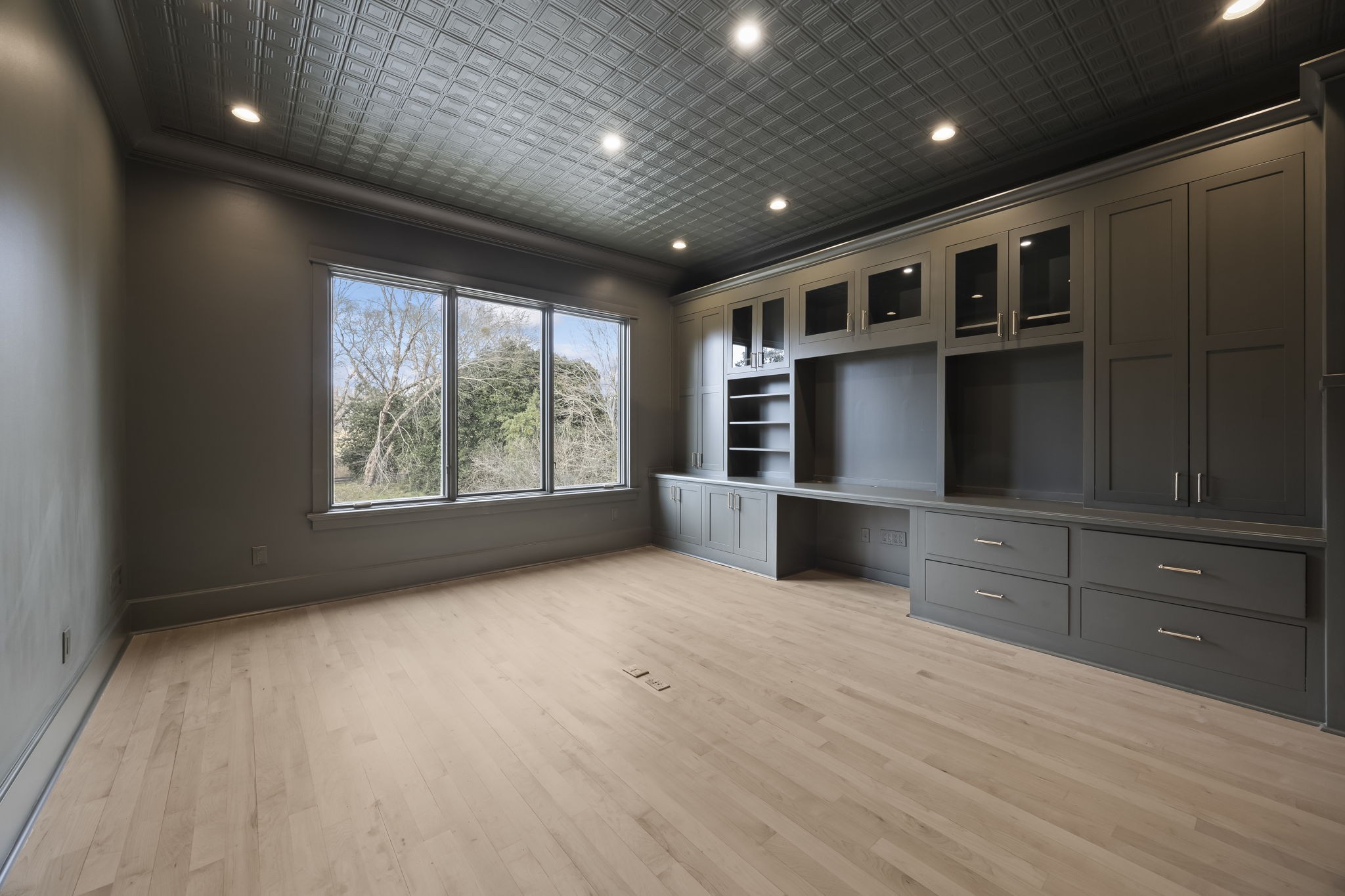 833 Highgrove Circle Franklin, TN 37069 - Photo 16 of 83 a view of an empty room with wooden floor and a window