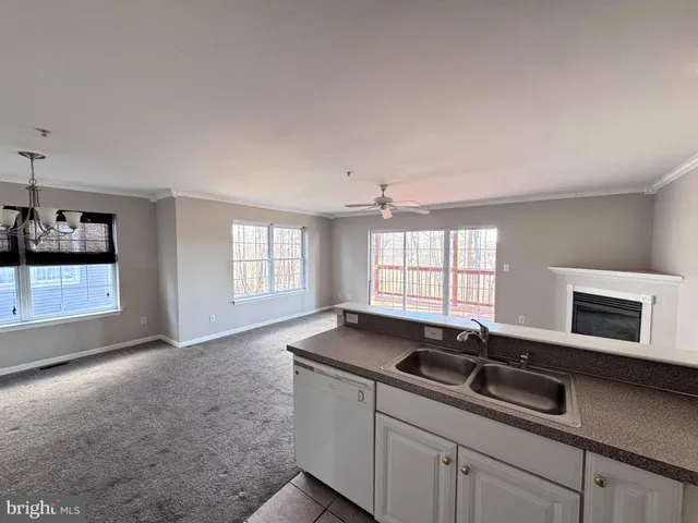a living room with a fireplace