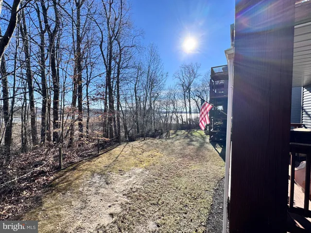 a view of balcony with wooden floor