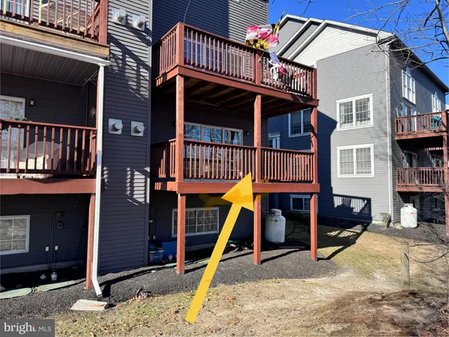 a spacious bathroom with a sink toilet and shower
