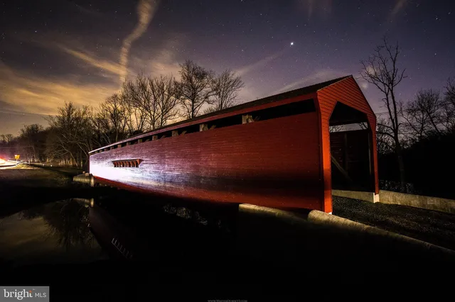 a view of backyard with green space