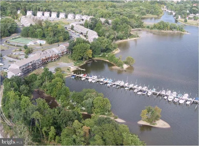 a view of a lake in middle of the town