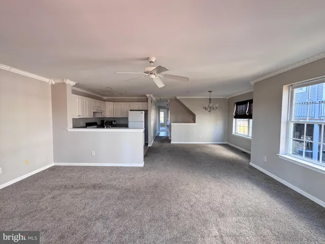 a view of a kitchen with a sink