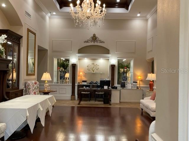 6501 Stone River Road, Unit 209 Bradenton, FL 34203 - Photo 18 of 45 a lobby with furniture and chandelier