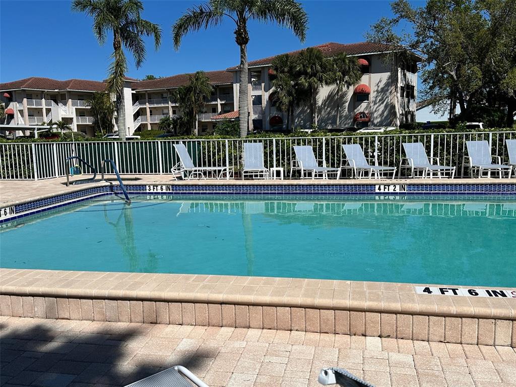 6501 Stone River Road, Unit 209 Bradenton, FL 34203 - Photo 43 of 45 a view of a house with a yard