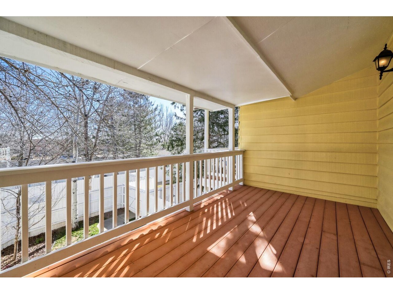 3515 Broadway, Unit B Boulder, CO 80304 - Photo 14 of 37 a view of balcony with wooden floor