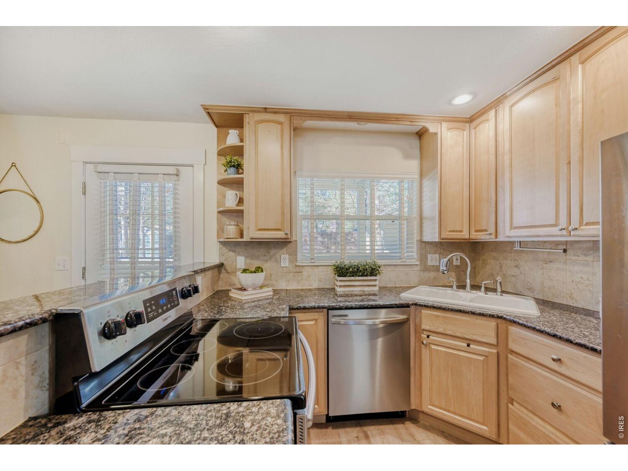 3515 Broadway, Unit B Boulder, CO 80304 - Photo 6 of 37 a kitchen with a sink stove and cabinets