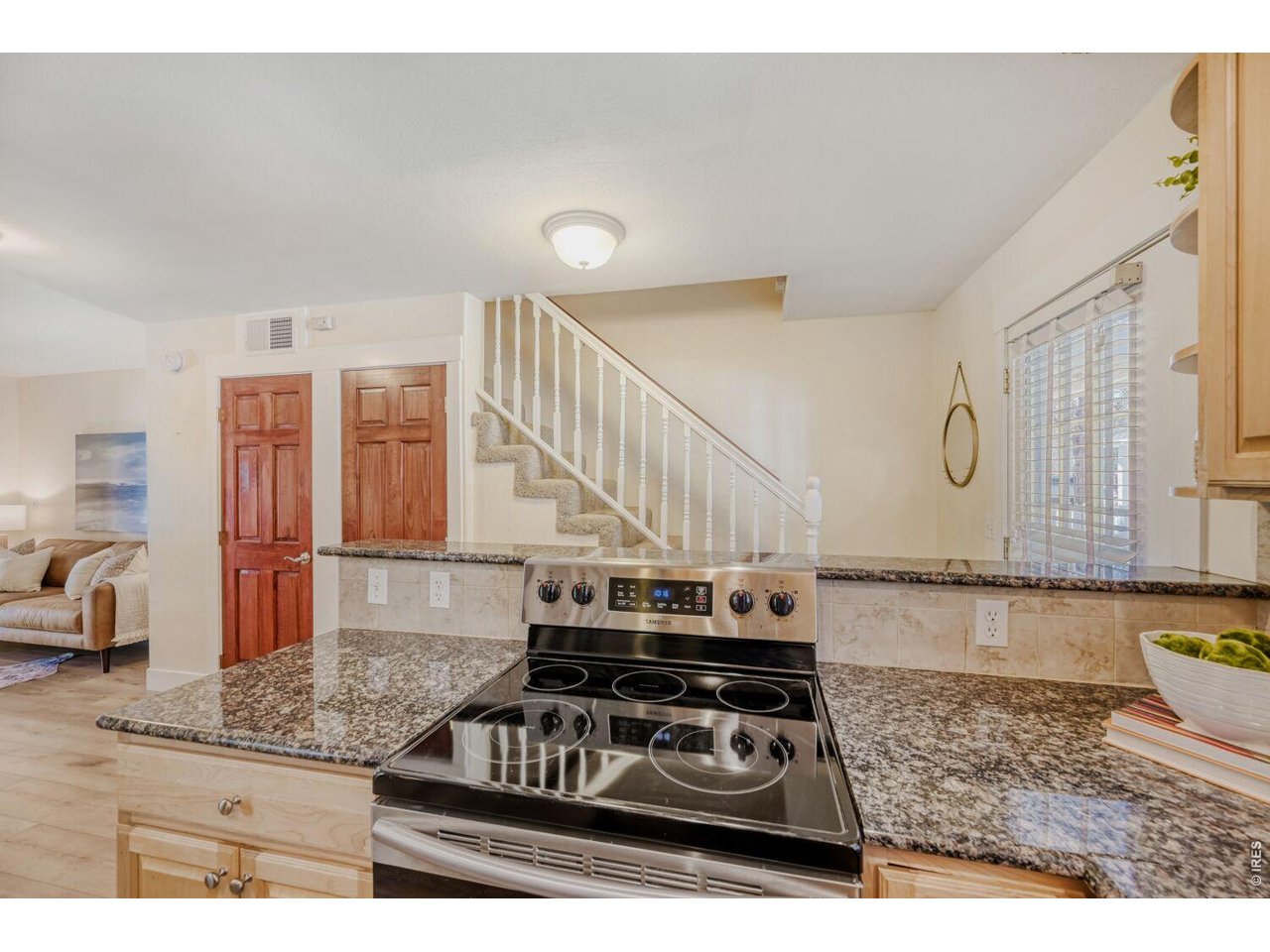 3515 Broadway, Unit B Boulder, CO 80304 - Photo 8 of 37 a kitchen with stainless steel appliances granite countertop a stove and a sink