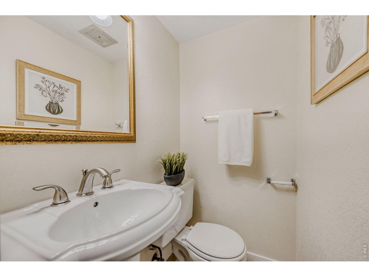 3515 Broadway, Unit B Boulder, CO 80304 - Photo 10 of 37 a bathroom with a sink mirror vanity and toilet
