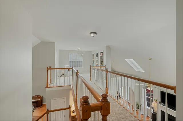 a view of a hallway with workspace