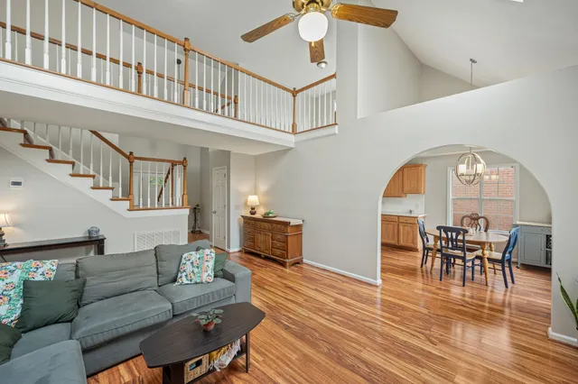 a living room with furniture and a table