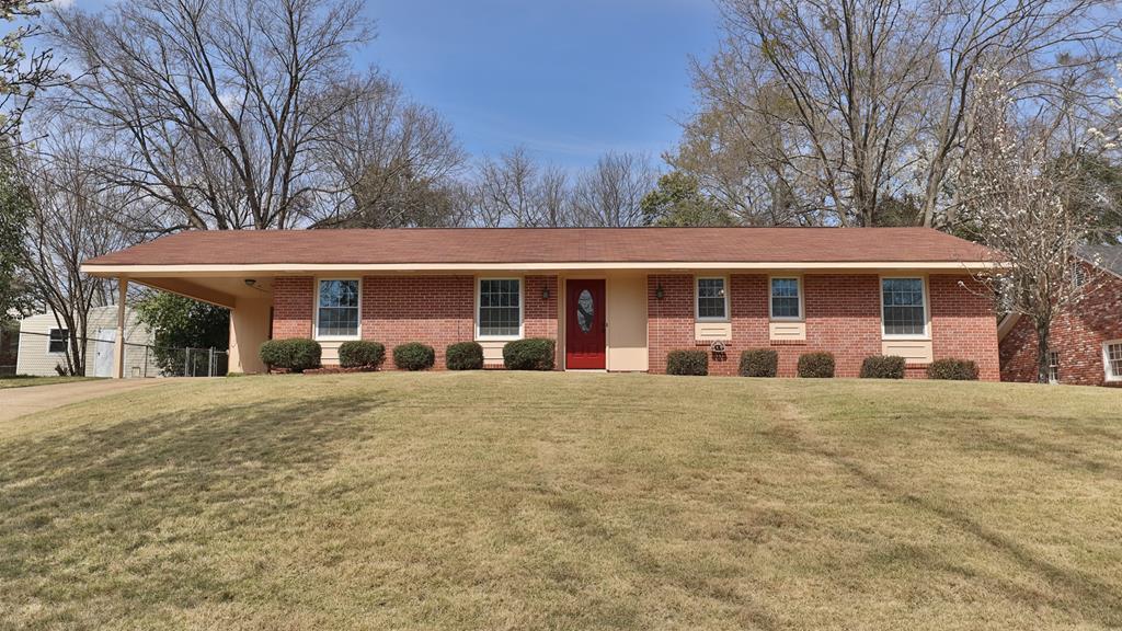 2113 Leeds Drive Columbus, GA 31904 - Photo 1 of 28 a front view of a building with a garden