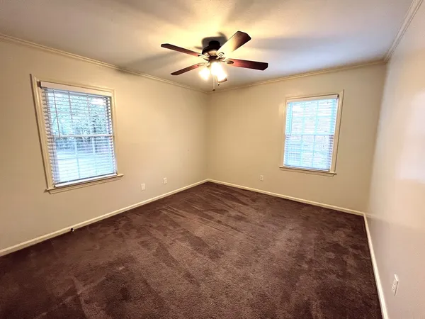 en view of an empty room with a window