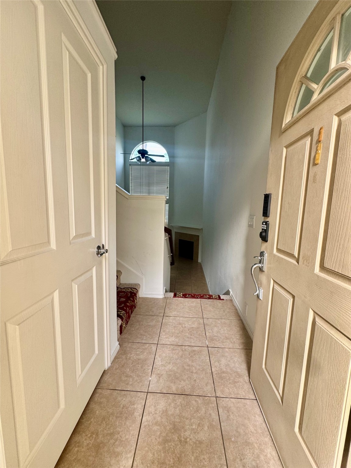 13600 Breton Ridge Street, Unit 36C Houston, TX 77070 - Photo 3 of 40 a view of an entryway with a mirror