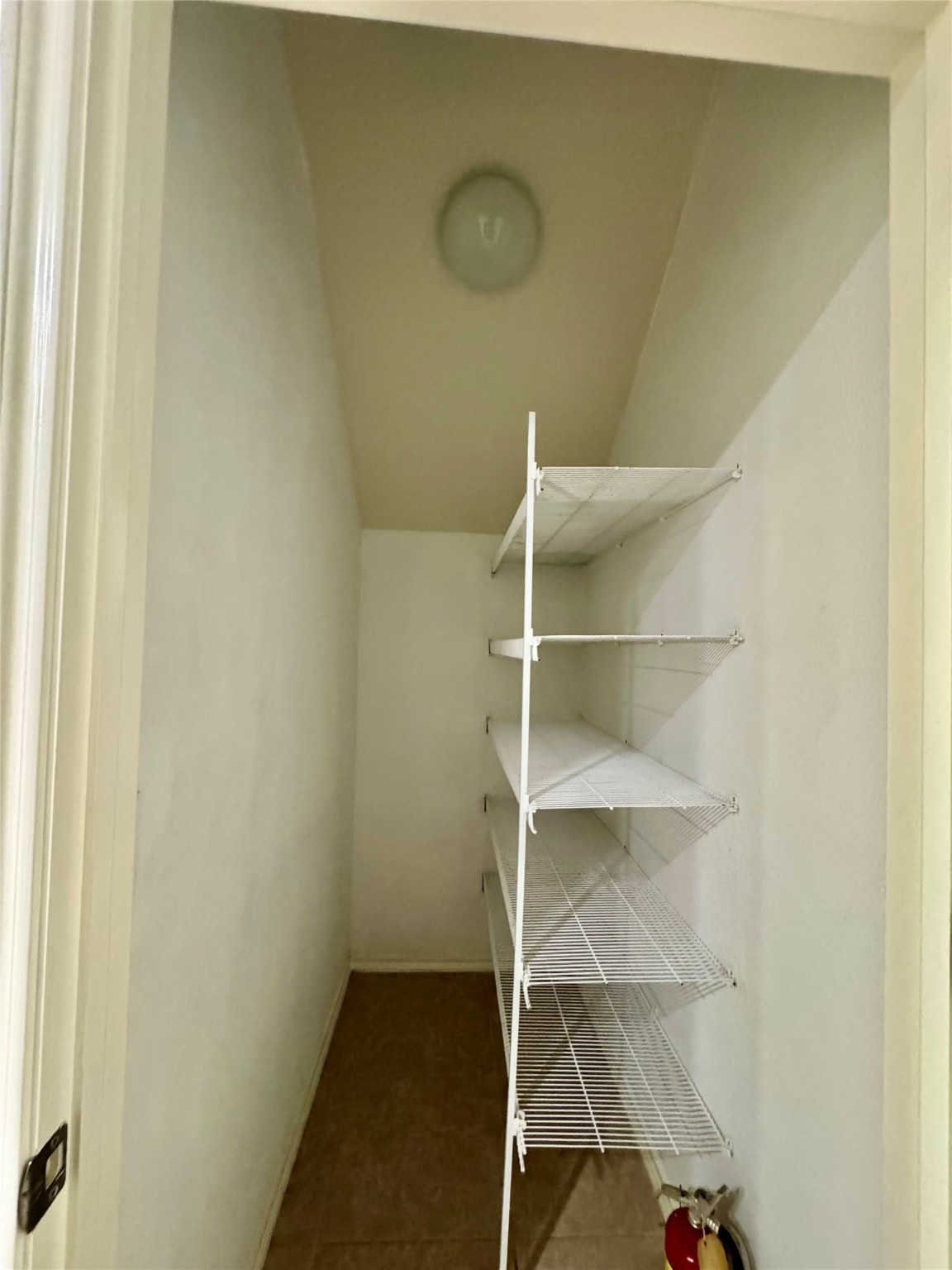 13600 Breton Ridge Street, Unit 36C Houston, TX 77070 - Photo 31 of 40 a view of an empty walk in closet