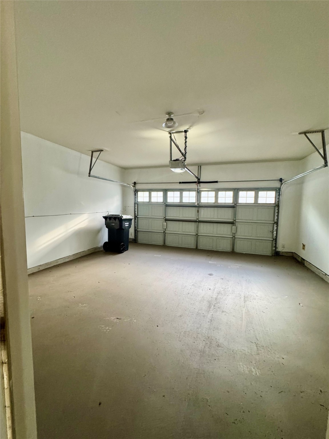 13600 Breton Ridge Street, Unit 36C Houston, TX 77070 - Photo 35 of 40 a view of room that has a car parked in it