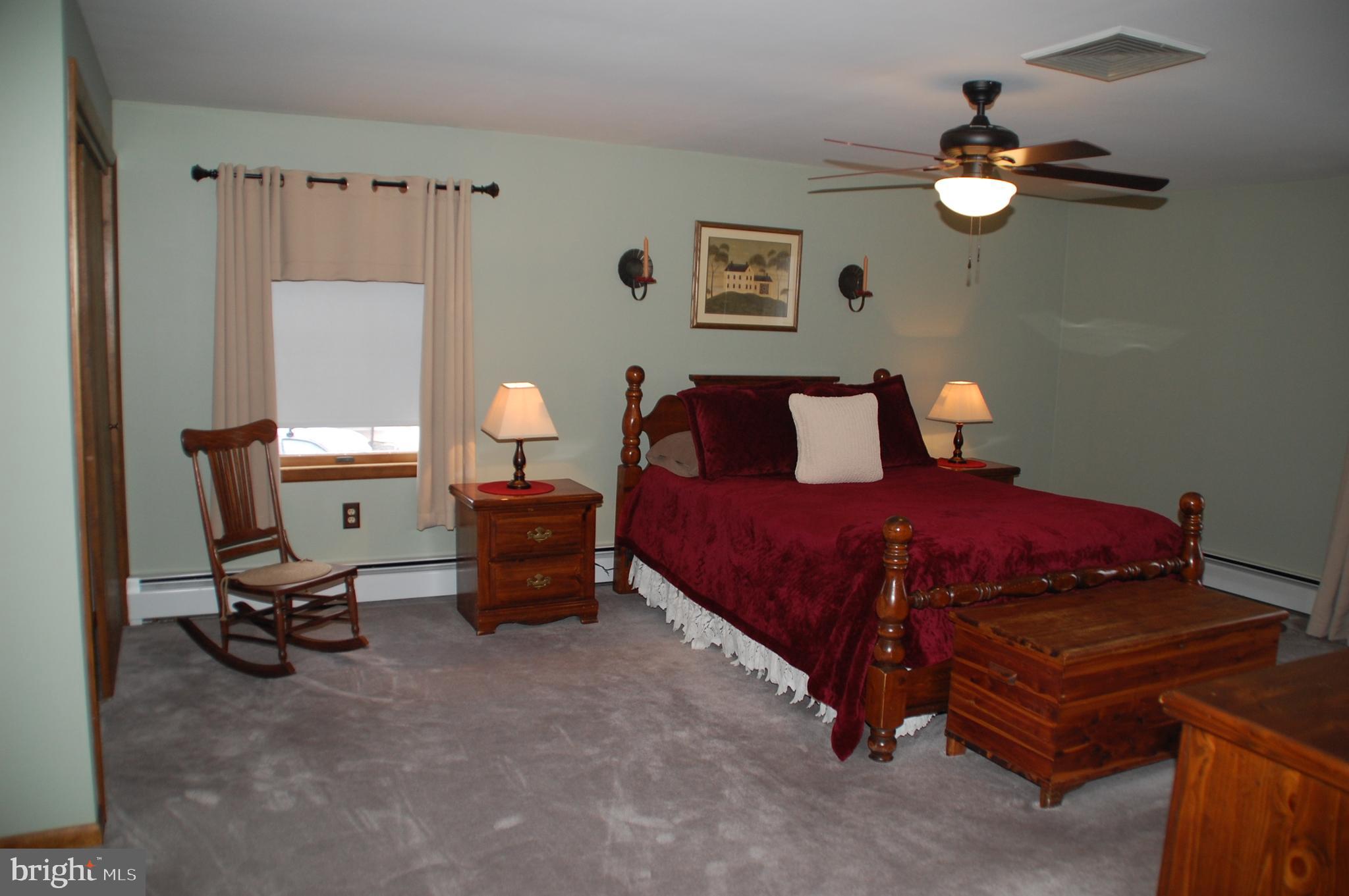 471 Mininger Road Souderton, PA 18964 - Photo 26 of 53 The wonderful Primary Bedroom has a ceiling fan...