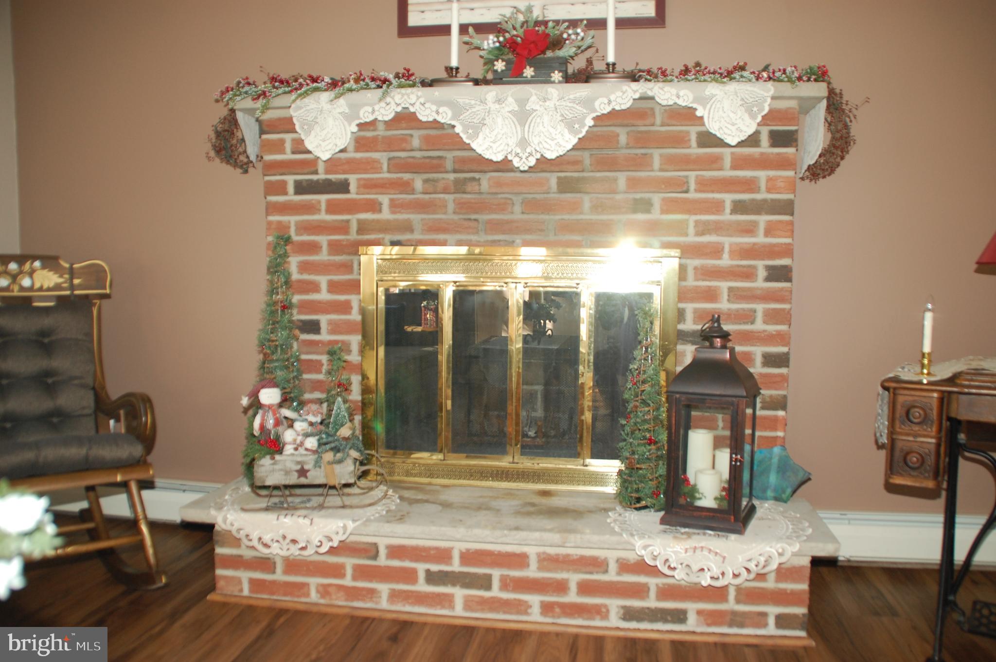471 Mininger Road Souderton, PA 18964 - Photo 5 of 53 and raised hearth brick Fireplace.