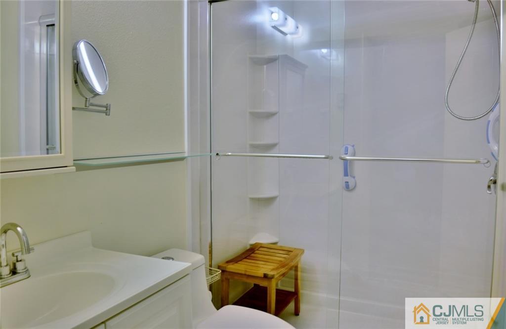 526 B Belford Road Monroe Township, NJ 08831 - Photo 11 of 13 a bathroom with a sink and shower