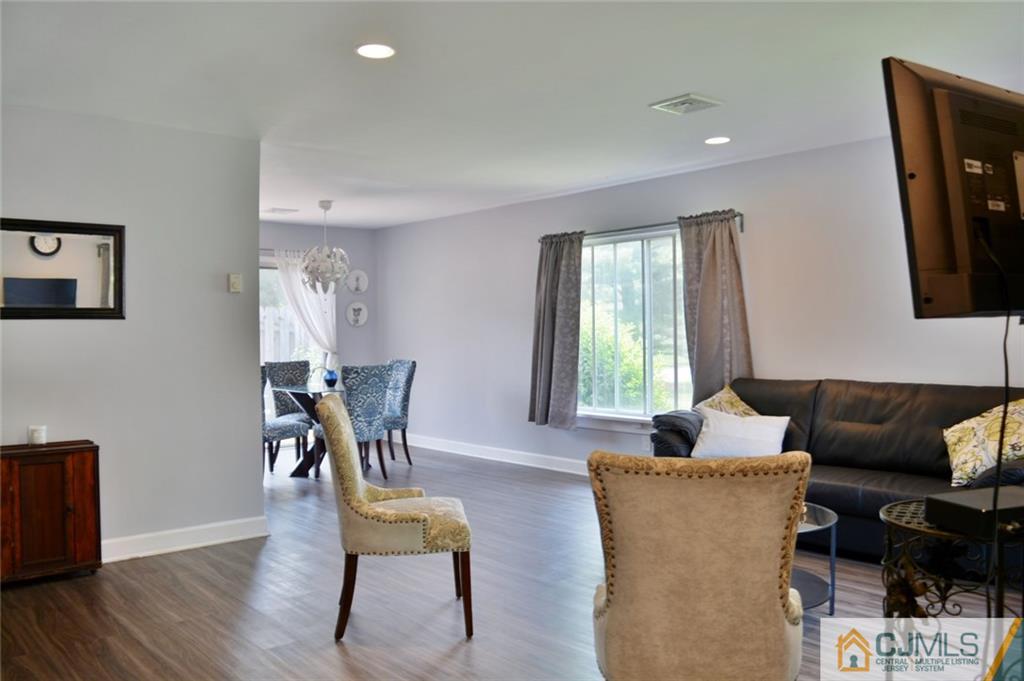 526 B Belford Road Monroe Township, NJ 08831 - Photo 5 of 13 a living room with furniture and a window