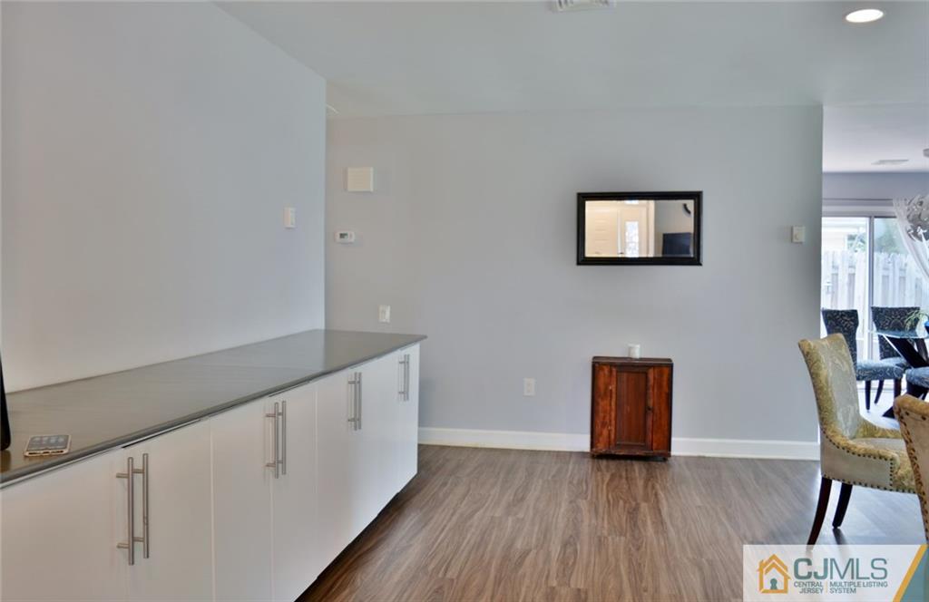 526 B Belford Road Monroe Township, NJ 08831 - Photo 9 of 13 a view of kitchen with furniture and wooden floor