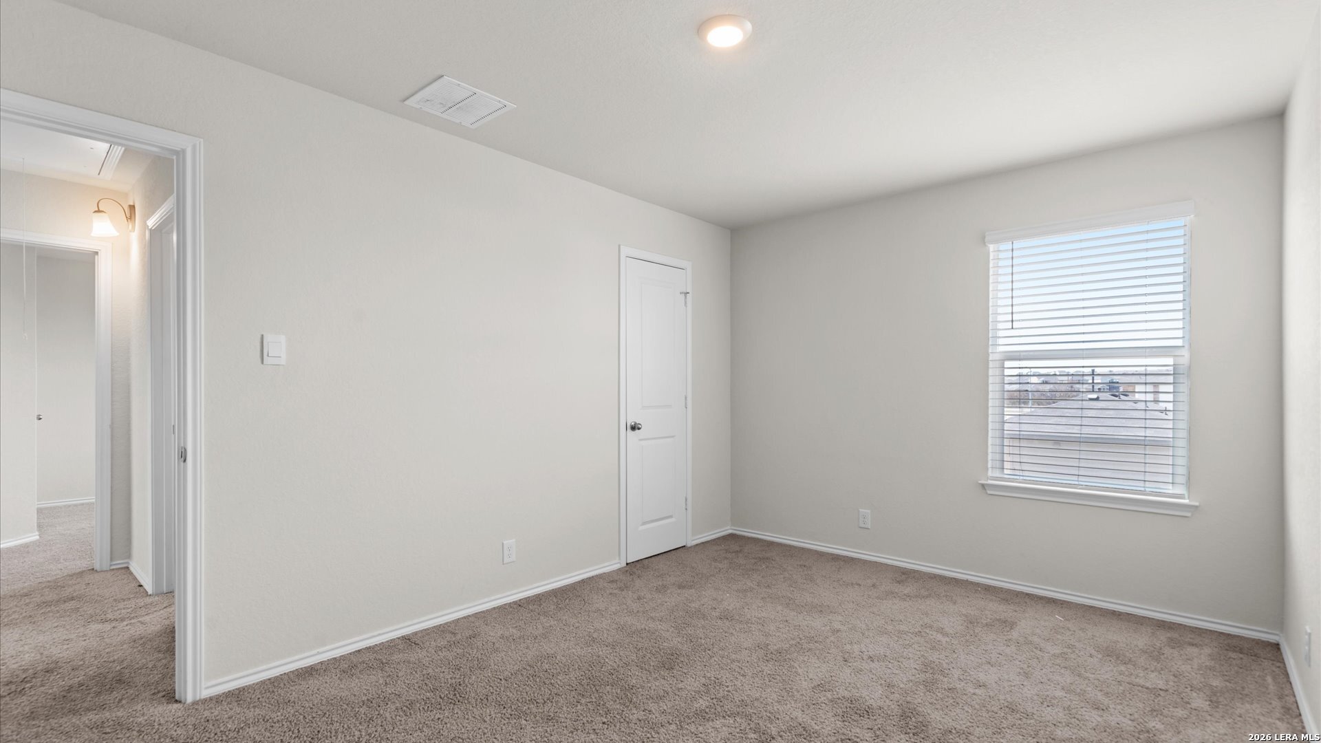 6819 Rondo Measure San Antonio, TX 78252 - Photo 14 of 25 a view of a room that has a window in it