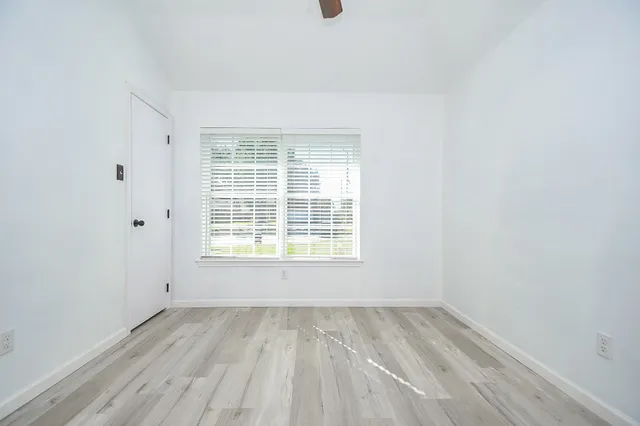 an empty room with a window