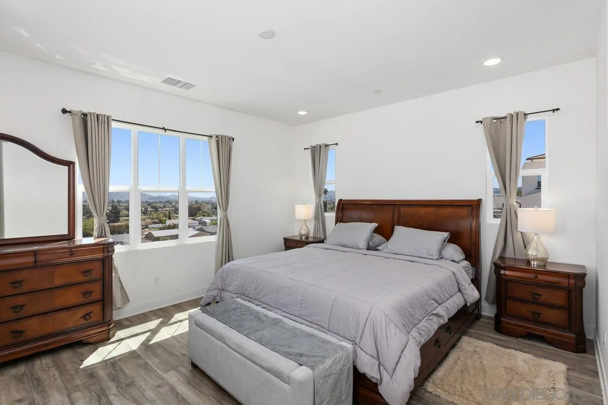8741 Weston Road Santee, CA 92071 - Photo 14 of 53 a bedroom with a bed and a window