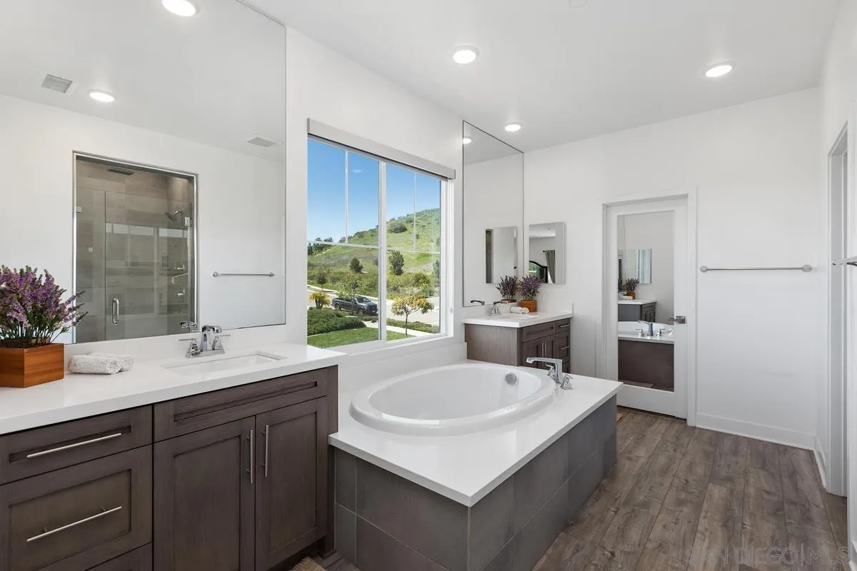 8741 Weston Road Santee, CA 92071 - Photo 16 of 53 a kitchen with a sink a counter top space and appliances