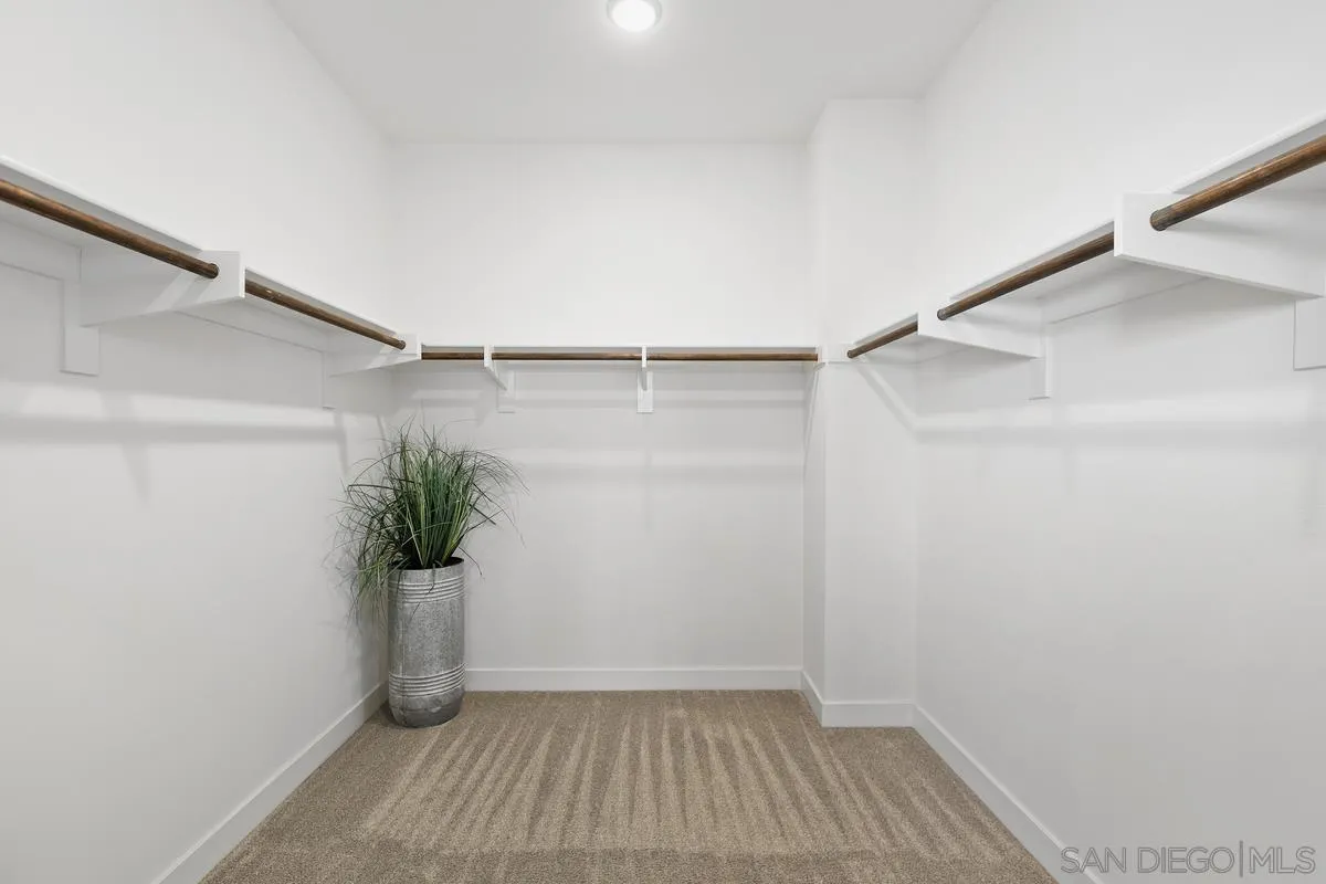 8741 Weston Road Santee, CA 92071 - Photo 17 of 53 a very nice looking room with a potted plant and a shower