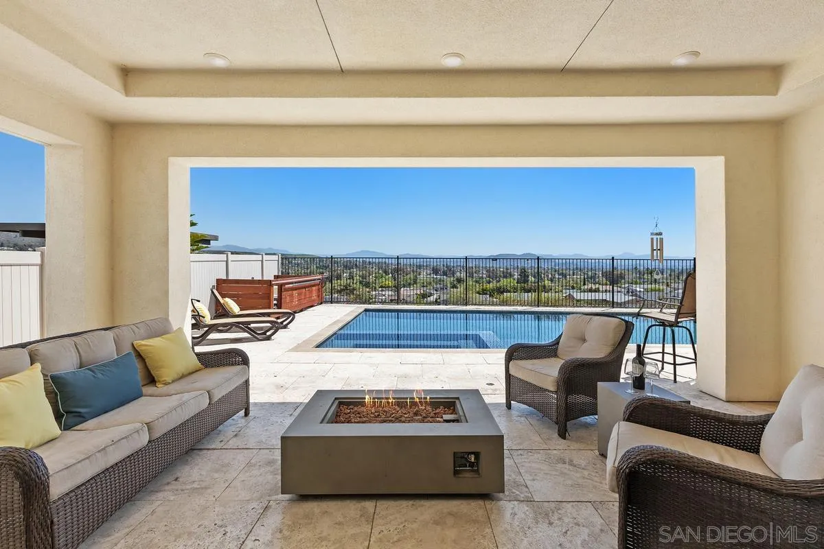 8741 Weston Road Santee, CA 92071 - Photo 2 of 53 a living room with furniture and a fireplace