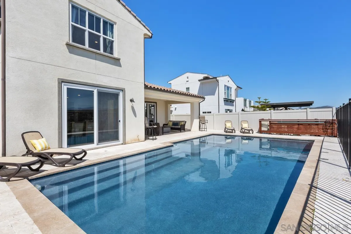 8741 Weston Road Santee, CA 92071 - Photo 33 of 53 a view of a patio with a table and chairs