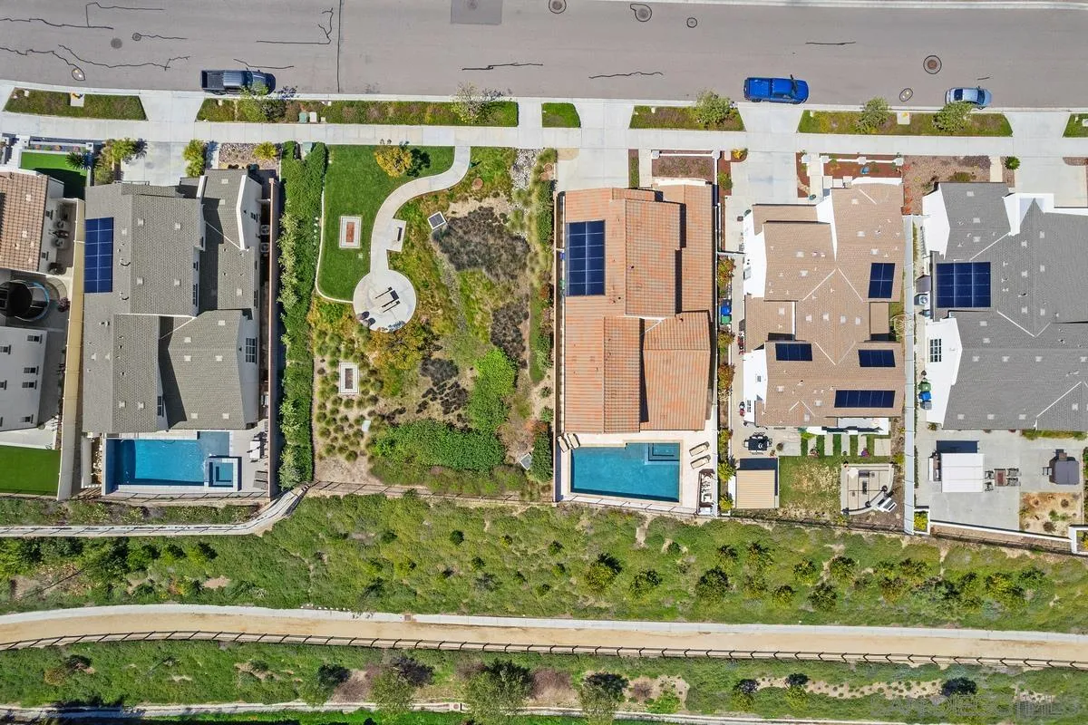 8741 Weston Road Santee, CA 92071 - Photo 34 of 53 a utility room with lots of different colored cloths