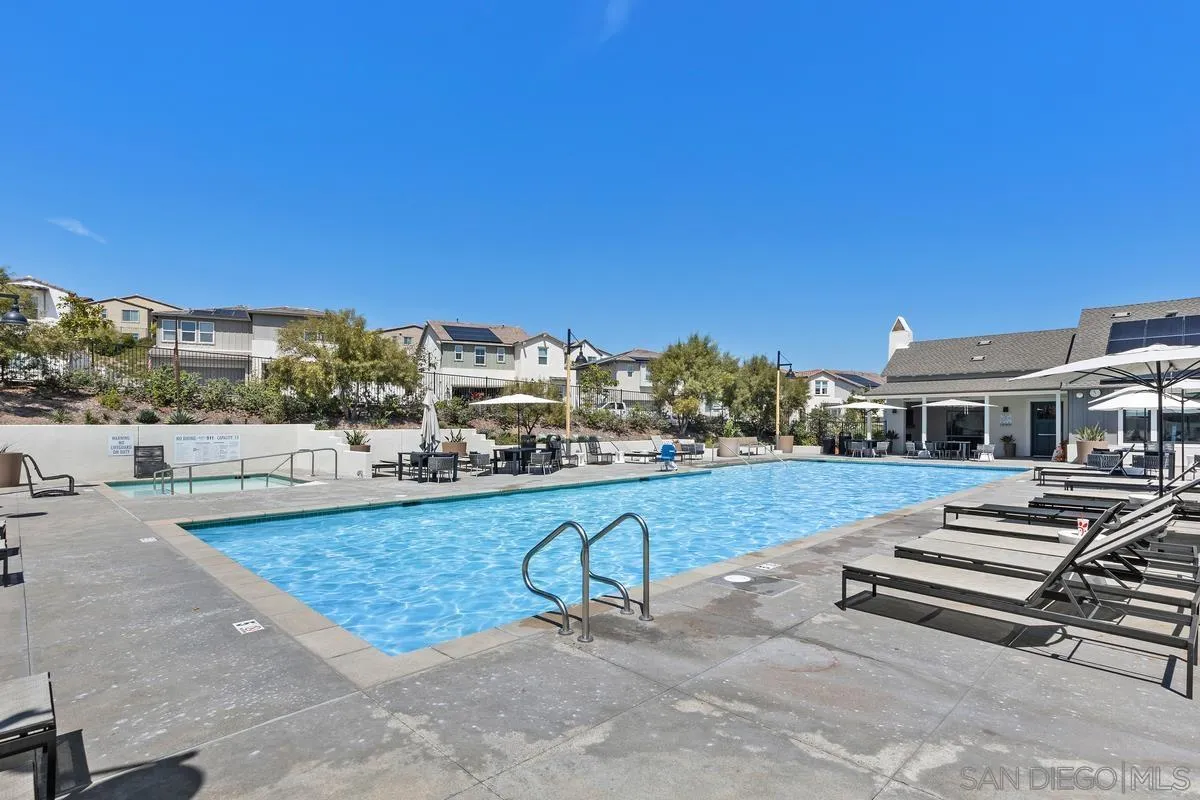 8741 Weston Road Santee, CA 92071 - Photo 42 of 53 a view of a swimming pool and lounge chairs