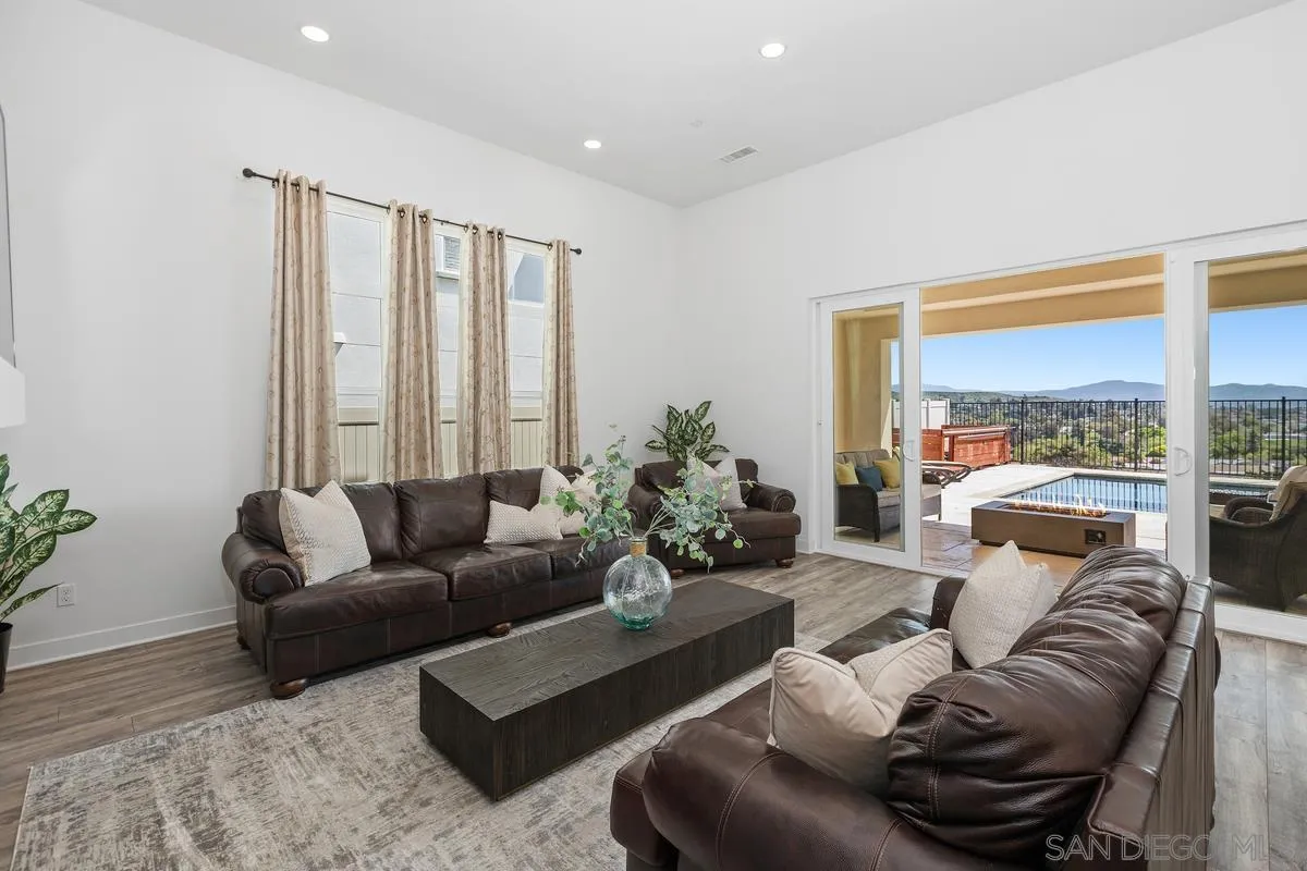 8741 Weston Road Santee, CA 92071 - Photo 6 of 53 a living room with furniture and a large window