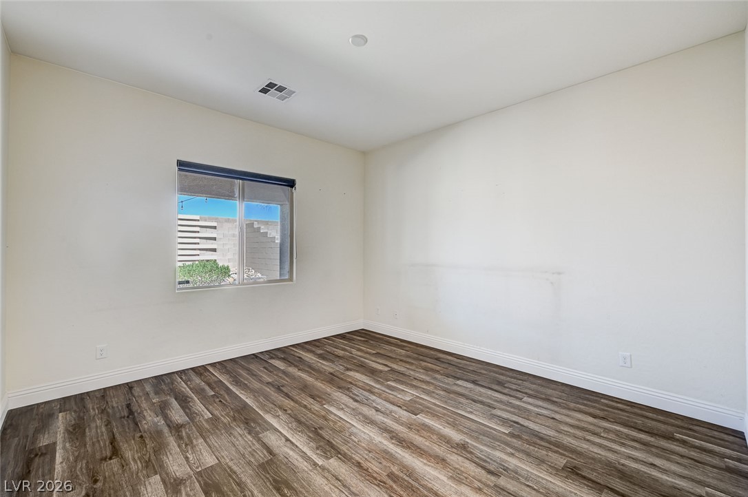 8197 Riley Love Street Las Vegas, NV 89139 - Photo 25 of 48 A well-lit room offers durable flooring and ample natural light.