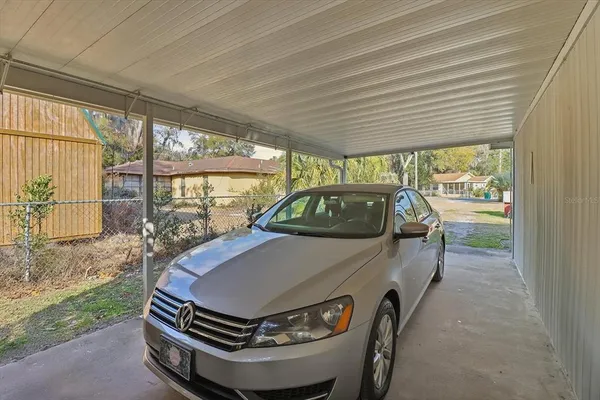 a view of house with a garden