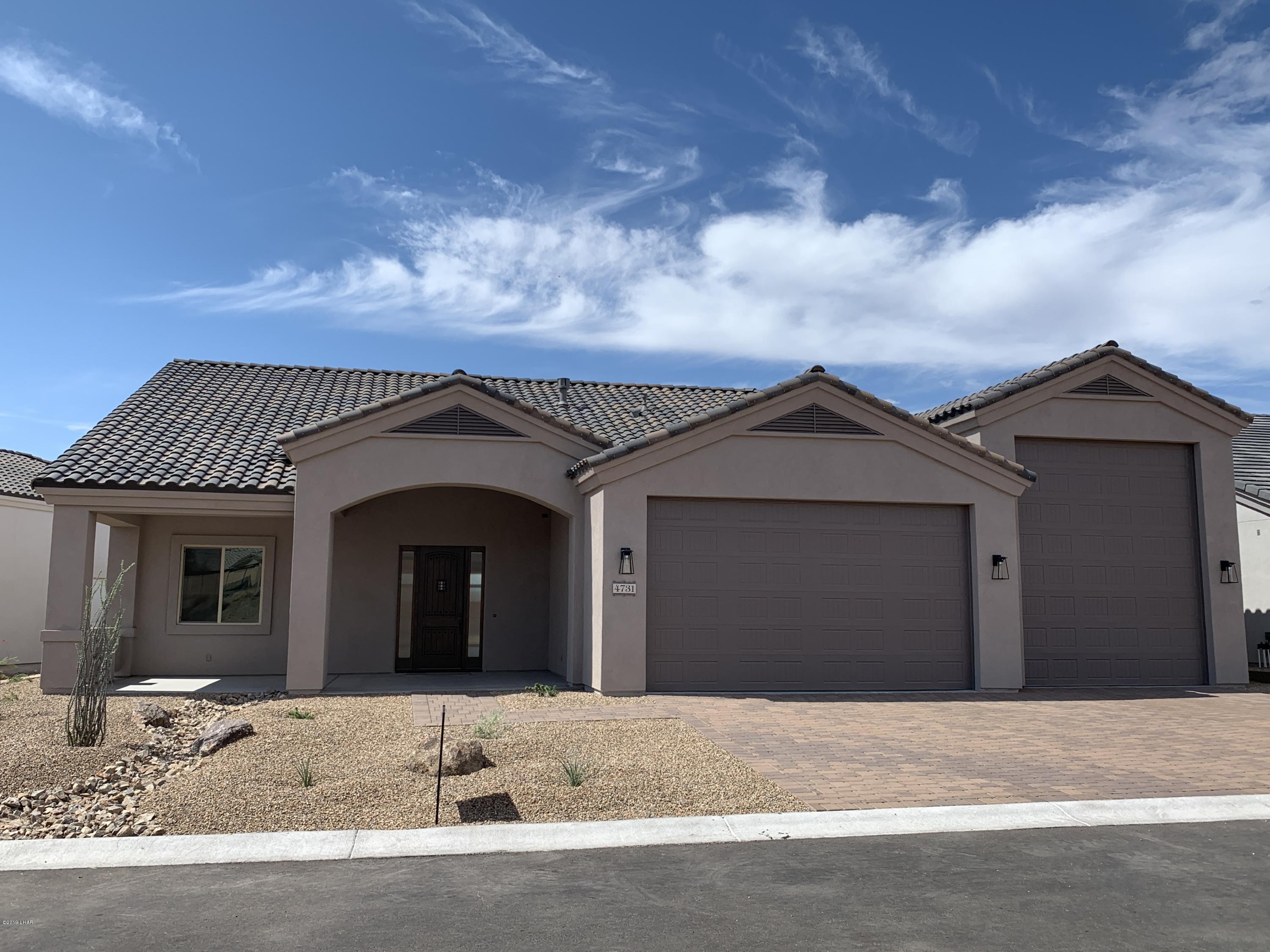 4731 North Juneberry Road Lake Havasu City, AZ 86404 - Photo 1 of 52 a view of a house with a street