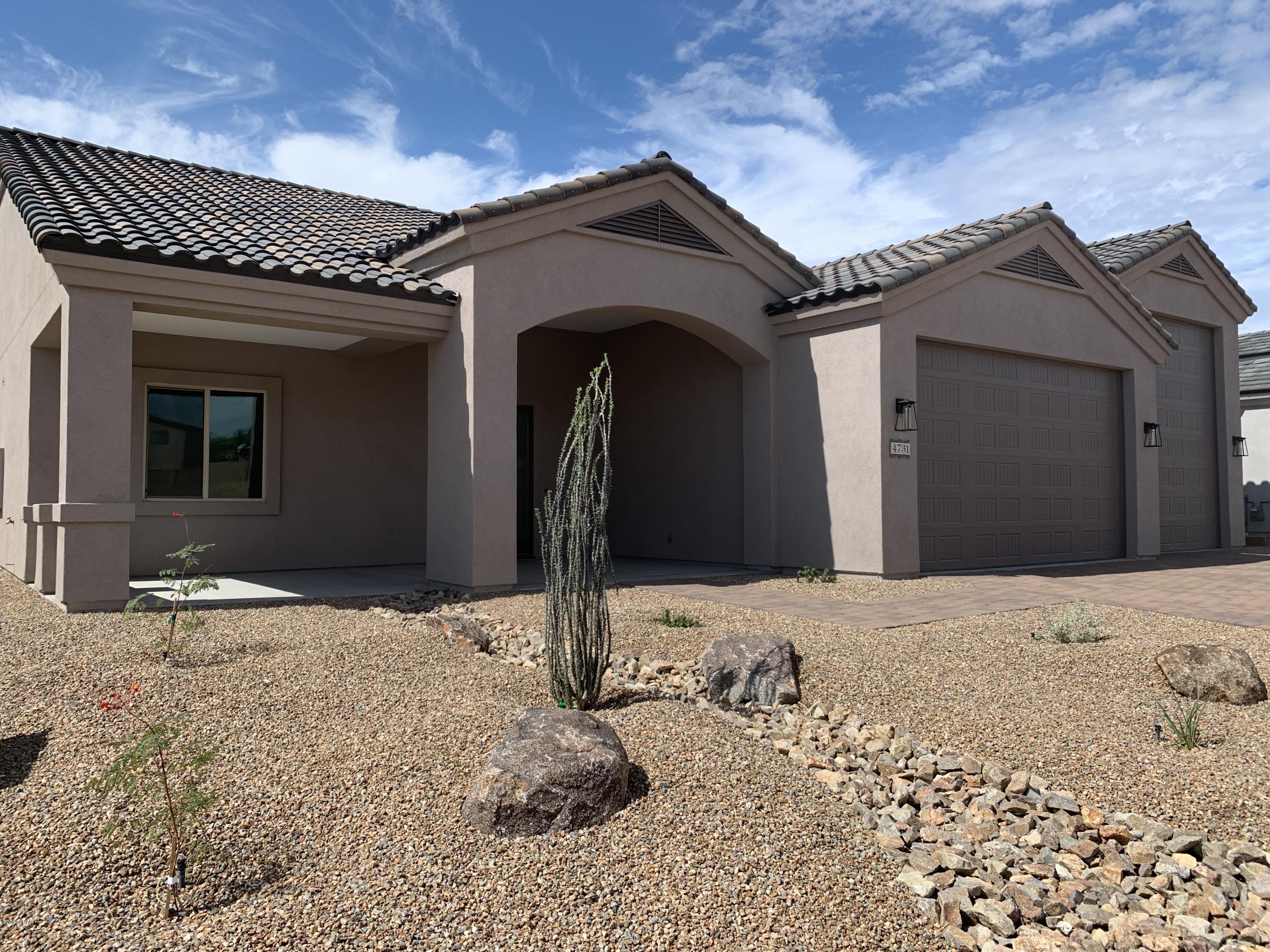 4731 North Juneberry Road Lake Havasu City, AZ 86404 - Photo 2 of 52 a front view of a house