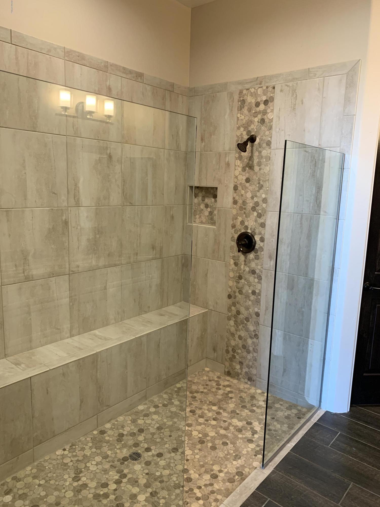 4731 North Juneberry Road Lake Havasu City, AZ 86404 - Photo 25 of 52 a bathroom with a shower and a sink