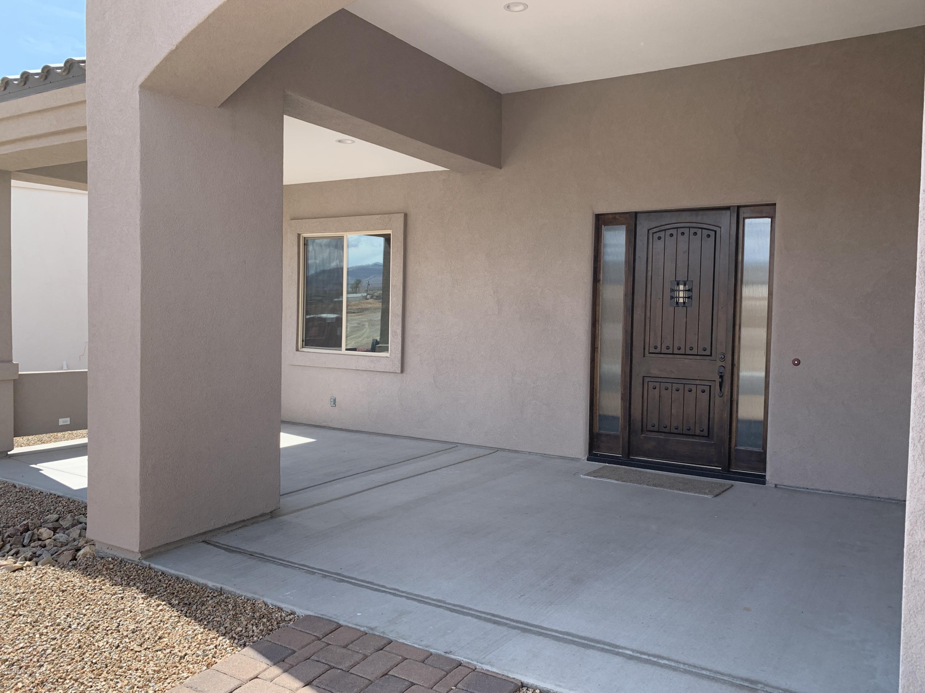 4731 North Juneberry Road Lake Havasu City, AZ 86404 - Photo 4 of 52 an empty room with windows