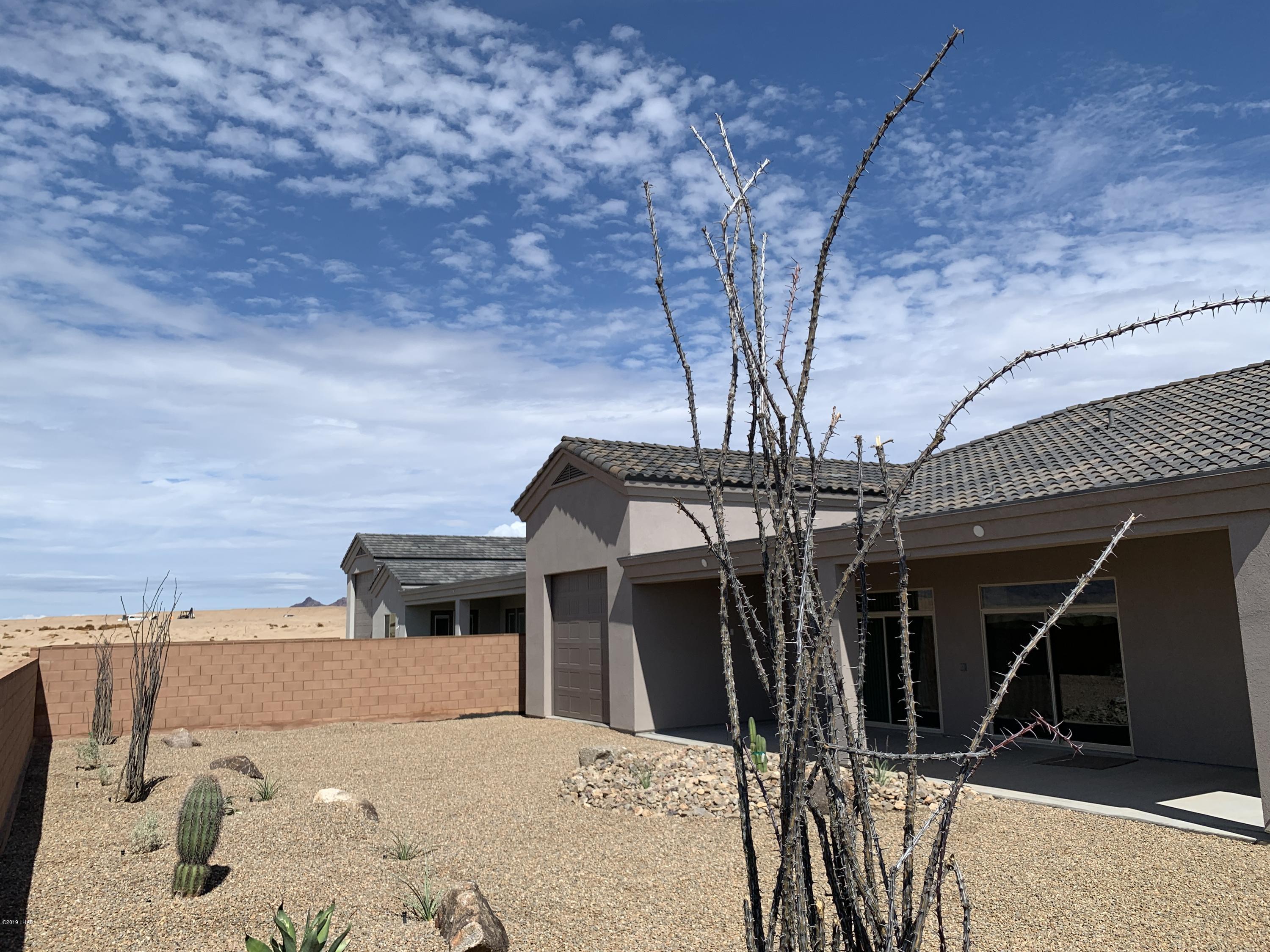 4731 North Juneberry Road Lake Havasu City, AZ 86404 - Photo 48 of 52 a view of a house with backyard