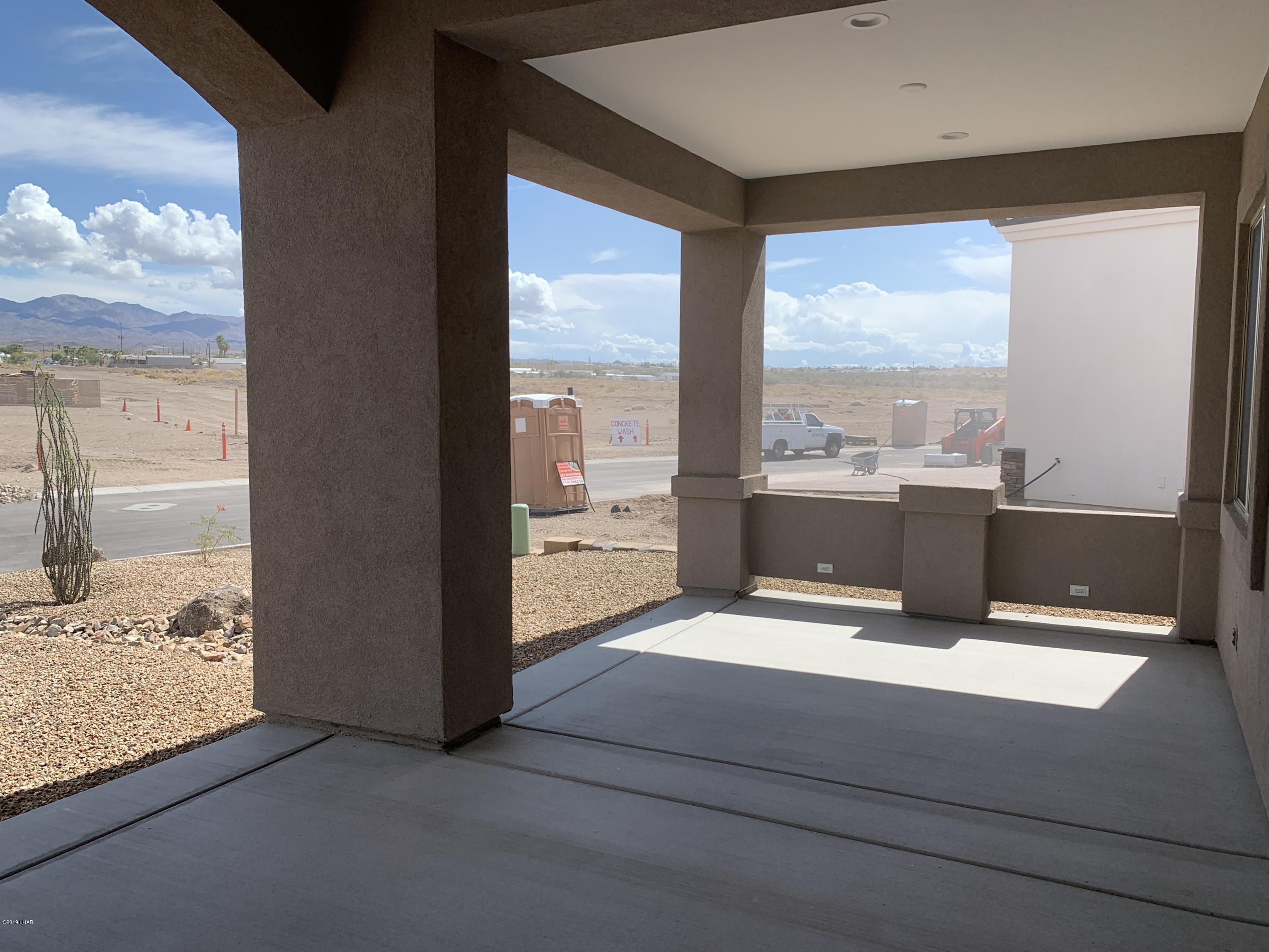 4731 North Juneberry Road Lake Havasu City, AZ 86404 - Photo 5 of 52 a view of a living room and floor to ceiling window or kitchen