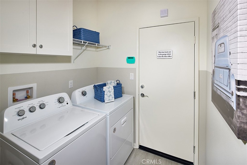 28484 Memory Lane Winchester, CA 92596 - Photo 11 of 12 a utility room with dryer and washer